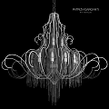 Elegant Ornate Chandelier With Curved Metal Frame Multiple Bulbs And Hanging Tassels