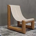 Minimalist Accent Chair With Wooden Frame And Light Fabric Seat In Indoor Setting