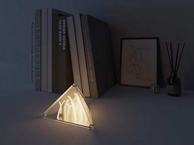 Modern Tower Shaped Lamp On Tabletop With Stacked Books Picture Frame And Reed Diffuser 3d model