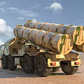 Camouflage Multi Wheeled Military Functional Vehicle With Missile Launchers On Desert Terrain