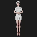 Woman In White Nurse Uniform With Cap Standing In Elegant Posture And High Heels