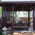 Traditional Chinese Wooden Pavilion Garden With Lattice Structure Stone Decorations Benches And Lanterns