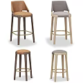 Modern Bar Stools With Wooden Frames And Varied Colored Cushion Seats