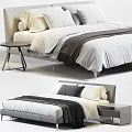 Modern Double Bed With White Bedding Dark Blanket And Small Side Table