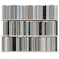 Neatly Arranged Books and Magazines on Wooden Bookshelf with Multiple Shelves and Various Colors