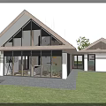 Modern Detached Villa With Gabled Roof Large Glass Windows And Green Lawn