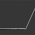 Sleek White Open Laptop Placed On Black Smooth Surface For Electronics