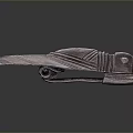 Insect Shaped Metal Craft With Carved Patterns And Dark Brown Glossy Finish