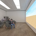 People Using VR Headsets In Room With Large Screen Desert Sky And Gray Chairs