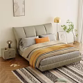 Modern Double Bed with Gray Upholstered Headboard Gray Orange Pillows Yellow Blanket and Floor Lamp
