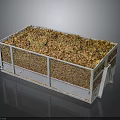 Mesh Sided Metal Storage Bin Filled With Dried Leaves And Debris