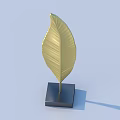 Golden Leaf Shaped Decorative Ornament Set With Black Square Base For Home Decoration