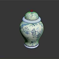 Carved Blue and White Ceramic Jar Sculpture With Floral Bird Designs And Lid