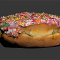 Pink Frosted Donut With Colorful Sprinkles On Black Background With Reflection