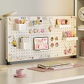 Cute Hanging Decorations on White Pegboard in Desk Workspace with Stationery Holders and Cartoon Charms