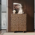 Modern Entryway Console Cabinet With Wavy Bronze Texture Decorative Items And Snowy Window View
