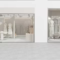 Elegant Modern Clothing Storefront With Window Display Mannequins And Dresses