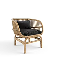 Wicker Leisure Chair With Black Cushion Natural Rattan Material For Indoor Outdoor Cozy Seating