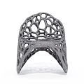 Gray Leisure Chair With Hollow Net Like Structure Modern Unique Geometric Hole Design