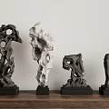 Unique Stone Ornaments on Wooden Surface with Black Bases and Holes