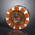 Intricate Circular Mechanical Device With Orange White Segments And Golden Rings
