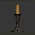 Vintage Candlestick Holder With Lit Yellow Candle And Ornate Design