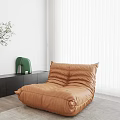 Brown Bean Bag Chair In Modern Living Room With White Curtains And Green Plant