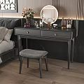 Modern Dressing Table With Round Mirror Gray Stool And Decorative Items In Bedroom