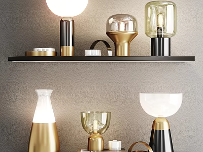Modern Table Lamps With Gold Black Accents And Glass Shades On Shelf 3d model