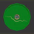 Green Circular Lawn With Central Building And Winding Tracks Around It