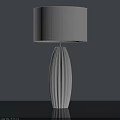 Modern White Ceramic Vertical Striped Table Lamp With Gray Fabric Lampshade Illuminated