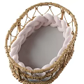Stylish Wicker Baby Crib With Pink Braided Accents And Gray Comfort Mattress