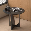 Stylish Modern Round Side Table With Vintage Camera Magazine And Unique Leg Design