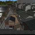 Traditional Commercial Street Featuring Stone Pavement And Wooden Shop Fronts On Both Sides