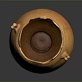 Ancient Orange Clay Sculpture Featuring Broken Rim Handles and Striped Decoration on Dark Background