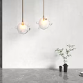 Modern Bubble Decor Glass Sphere Pendant Lights Hanging Against White Wall With Visible Bulbs