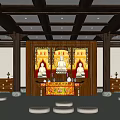 Buddhist Temple Worship Space With Three Buddha Statues Altar Table And Round Meditation Cushions