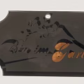 Black Garden Label With Floral Pattern And Bin im Garten Orange Text
