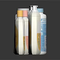 Baby Care Products In Colorful Bottles With Pump Dispensers And Labels