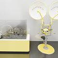 Yellow Mechanical Display Unit with Transparent Case Two Large Discs and Seat 3d model