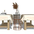 Wooden Frame Massage Beds with White Beige Linens and Side Table Dried Pampas Vase