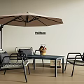 Outdoor Rattan Chairs with Black Frame and Coffee Table Under Beige Parasol on Wooden Floor