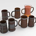Wooden Mugs Collection With Metal Accents and Orange Beverage