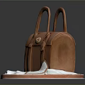 Brown Leather Handbag With Twin Handles Gold Buckle And White Tag