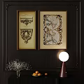 Abstract Paintings With Elaborate Patterns And Map Inspired Designs Hanging On Dark Wall With Table Lamp 3d model