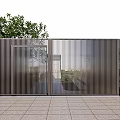 Modern Metal Slatted Entrance Gate With Green Trees And Stone Paved Ground