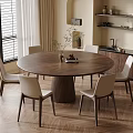 Elegant Round Wooden Dining Table Set with Six Light Chairs in Kitchen with Natural Light