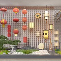 Colorful Chinese Lanterns Hanging On Lattice Wall With Miniature Rockery And Plants