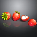 Fresh Strawberries With Green Leaves Whole And Sliced On Black Surface With Reflections