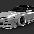 Silver Modified Sports Car With Lowered Stance Large Wheels And Aerodynamic Body Kit